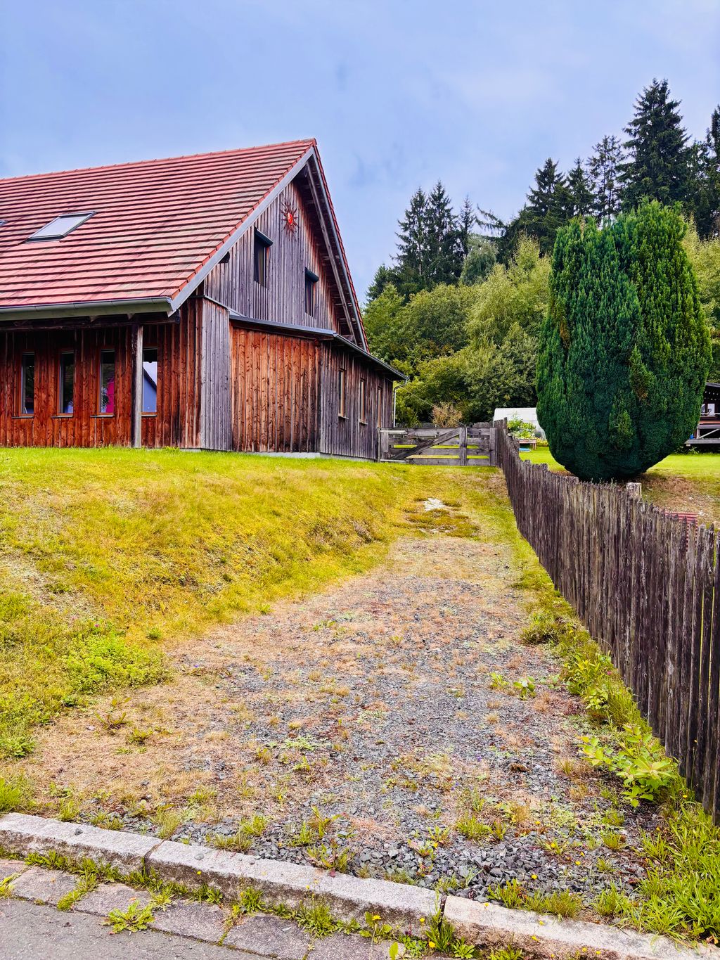 Pitch on the edge of the forest in a quiet residential area