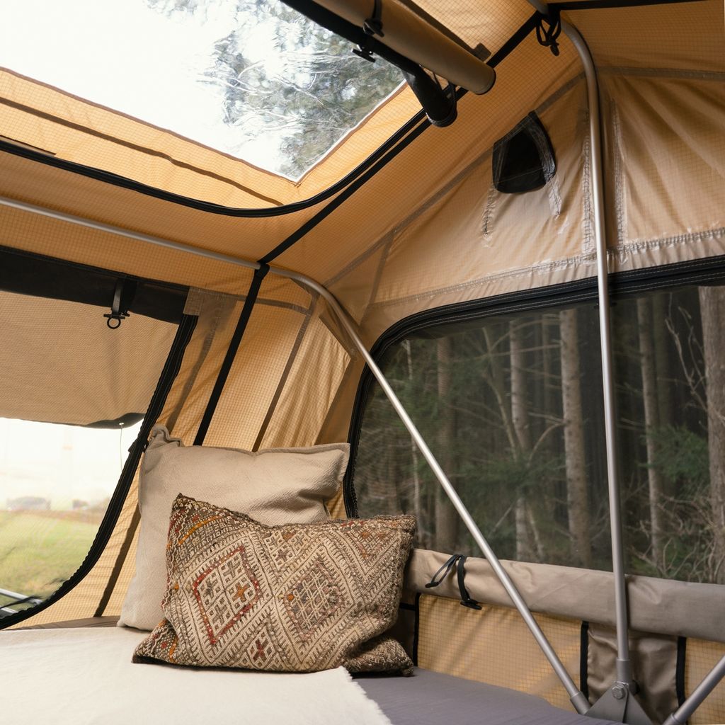 Lara - Rooftop tent adventure in the apple trees