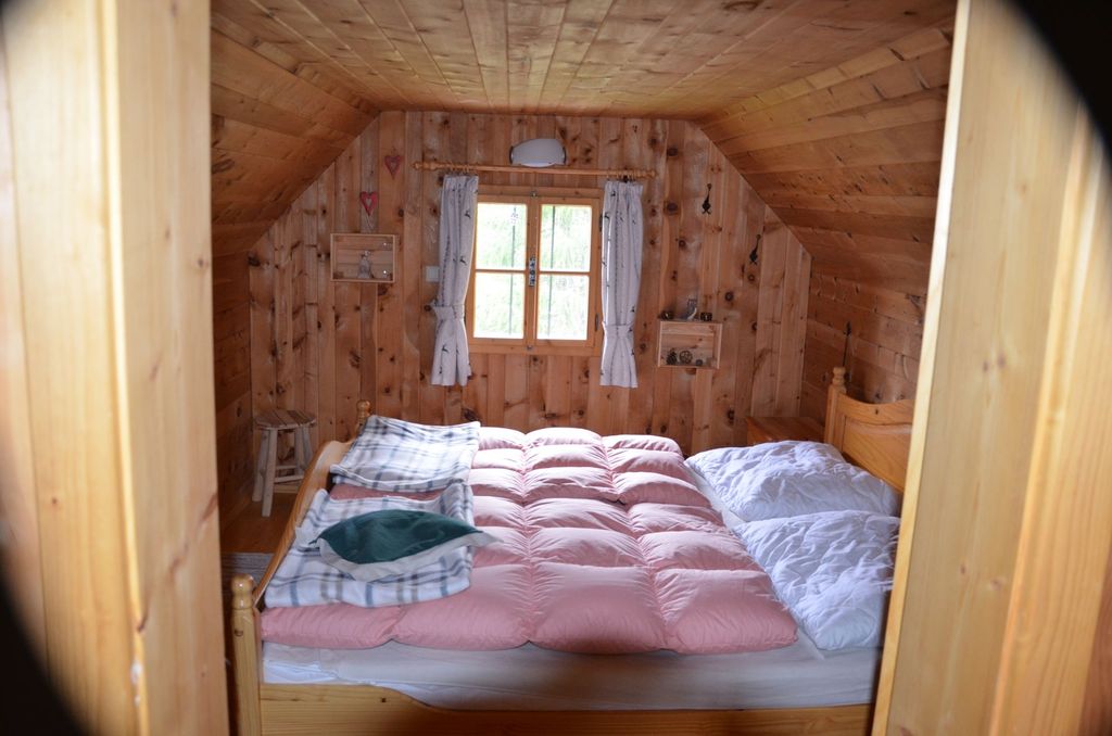 Wood ambassador Hütt'n with a dreamlike view