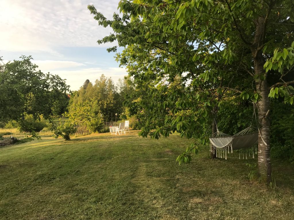 Farm camping between stream and meadows