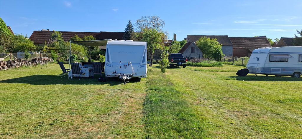 Spacious meadow on the edge of the village