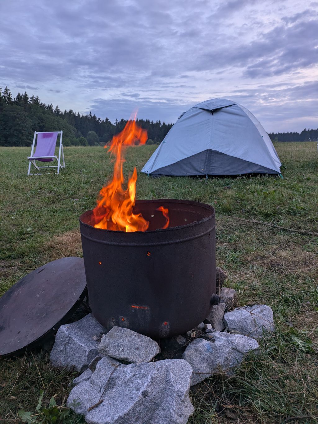 Camping on the alpine pasture and by the stream at 800 meters altitude