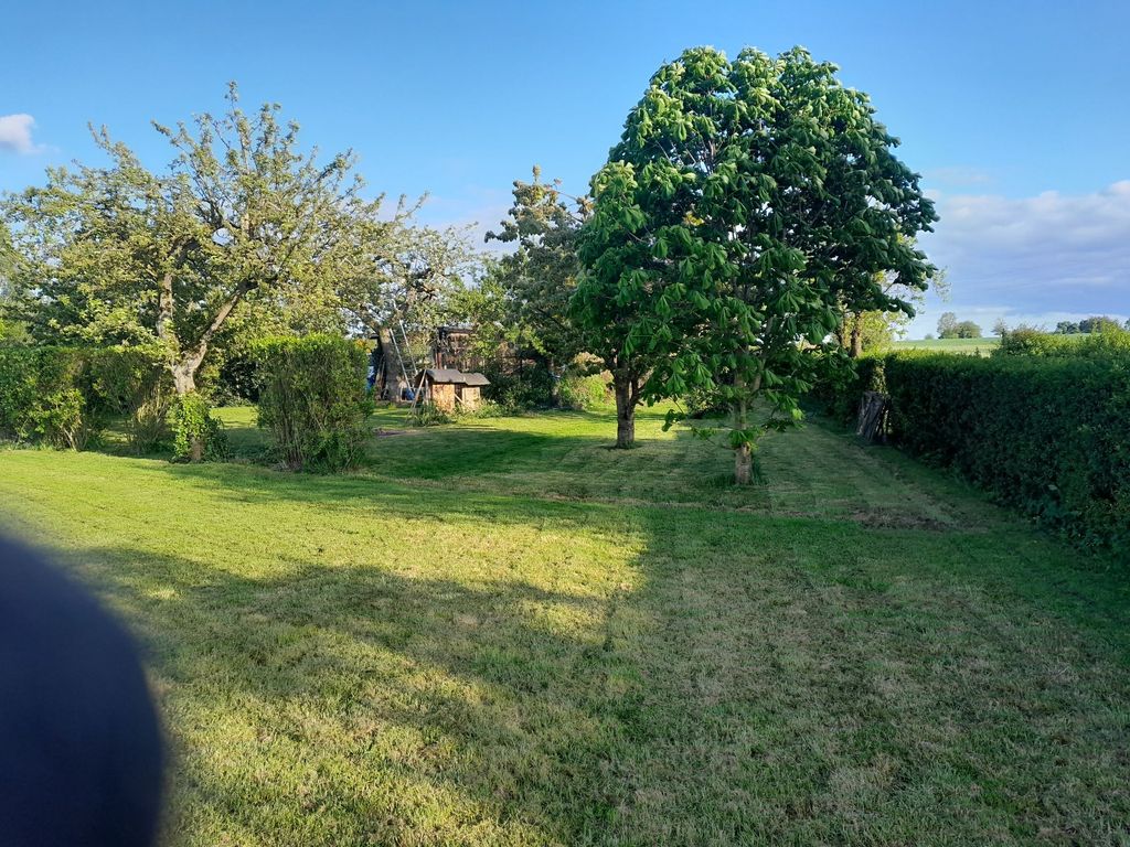 Camping in the orchard on the outskirts of the village