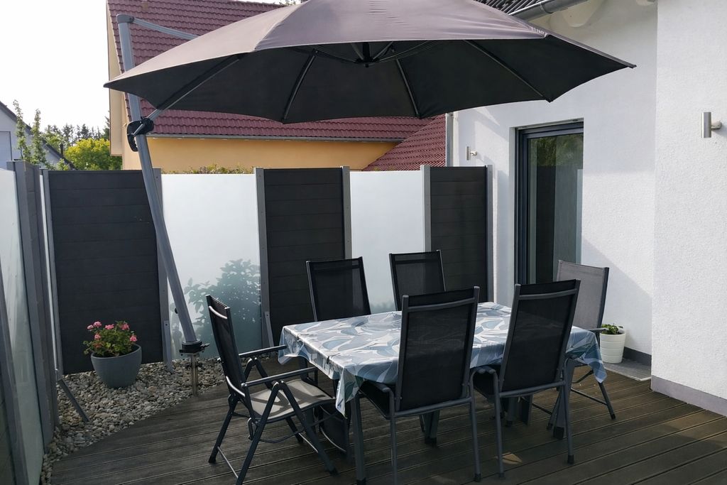 South-facing terrace with a parasol,
