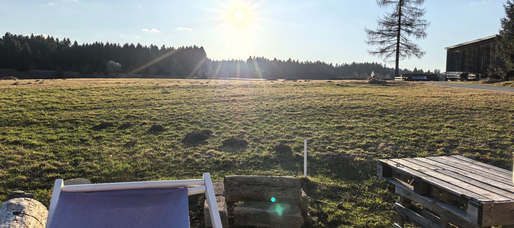 Camping on the alpine pasture and by the stream at 800 meters altitude