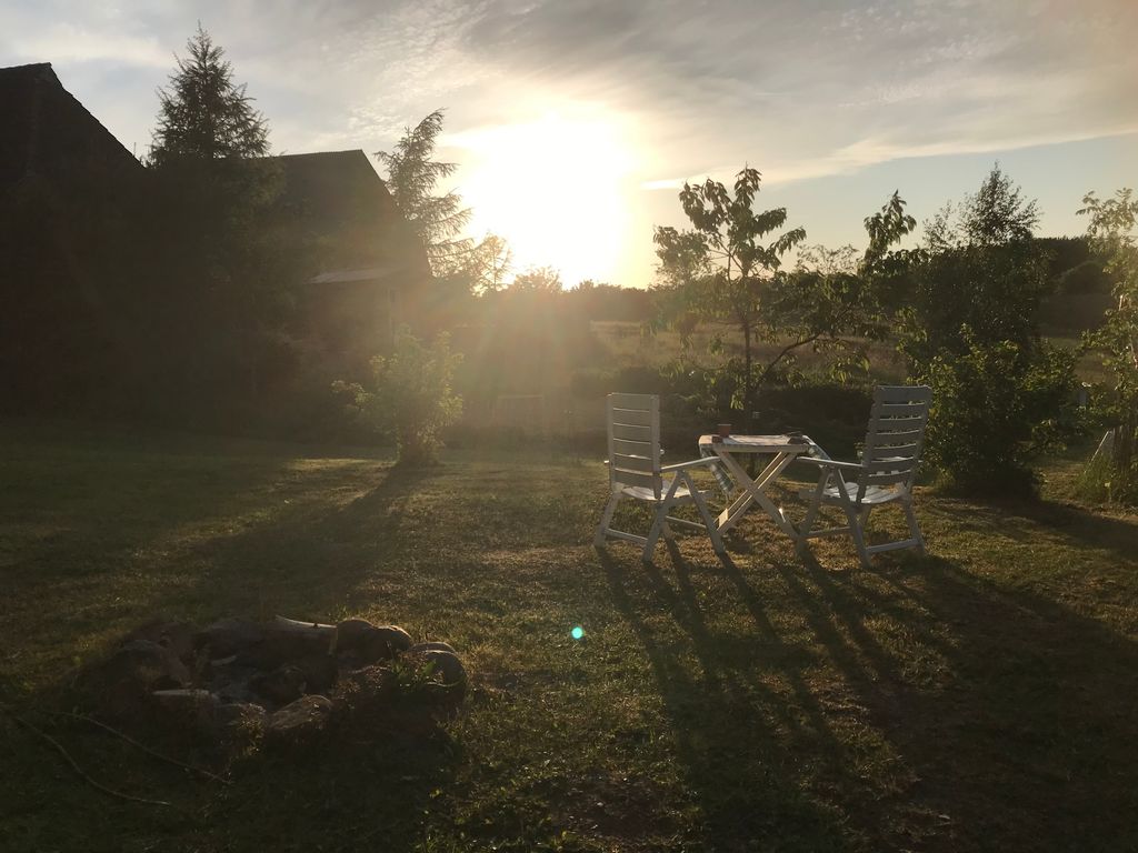 Farm camping between stream and meadows