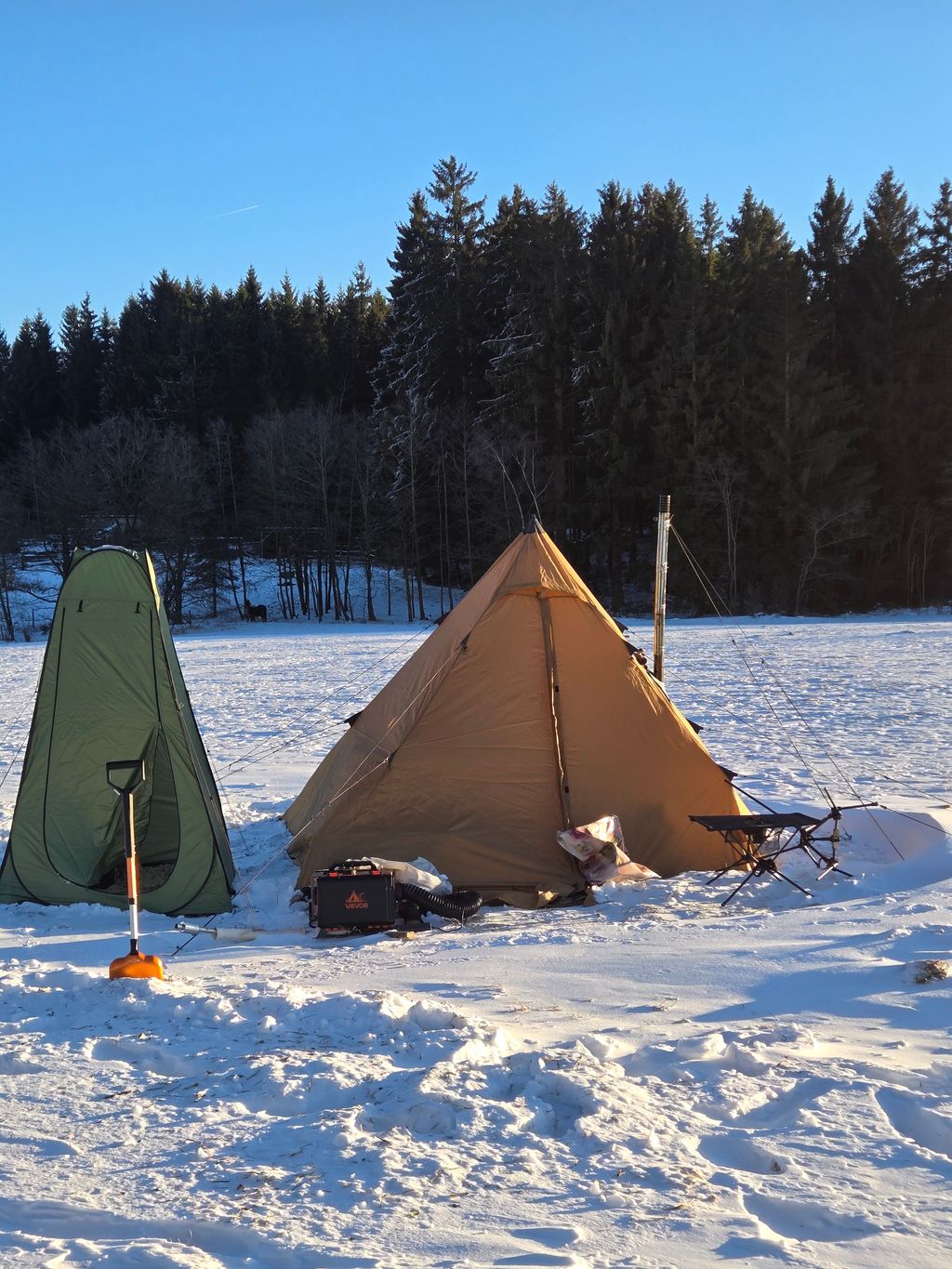 Camping on the alpine pasture and by the stream at 800 meters altitude