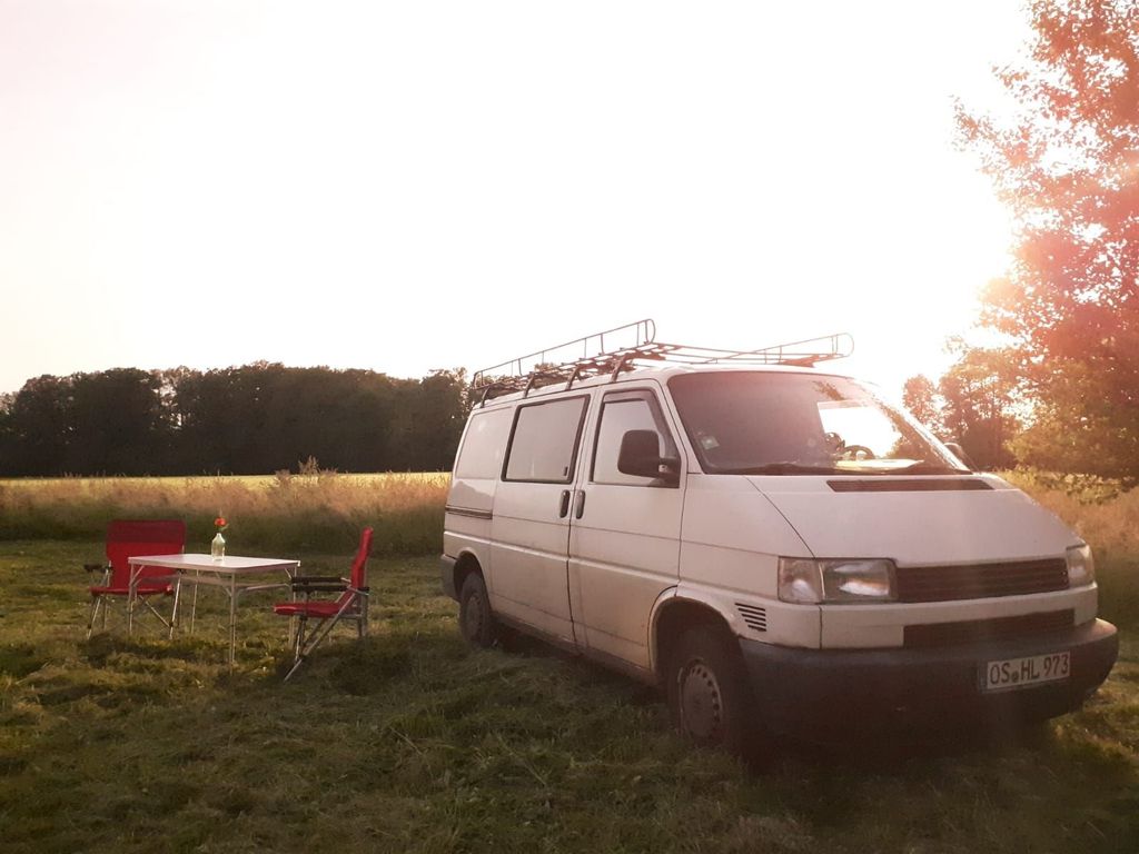 View of open field near old wheelwright's workshop