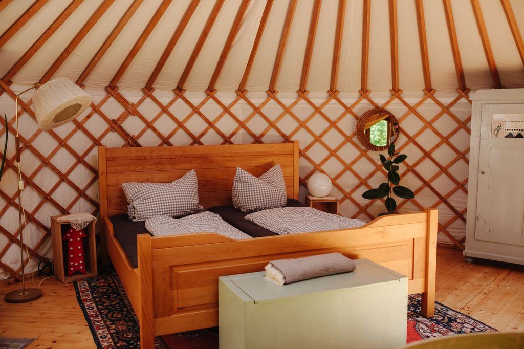 Yurt in nature at the natural pool in the Hasslachtal valley