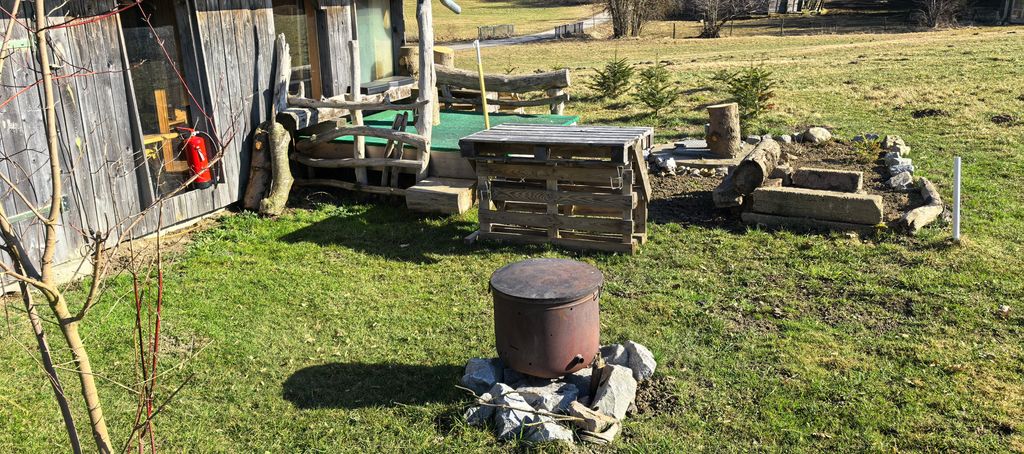 Camping on the alpine pasture and by the stream at 800 meters altitude