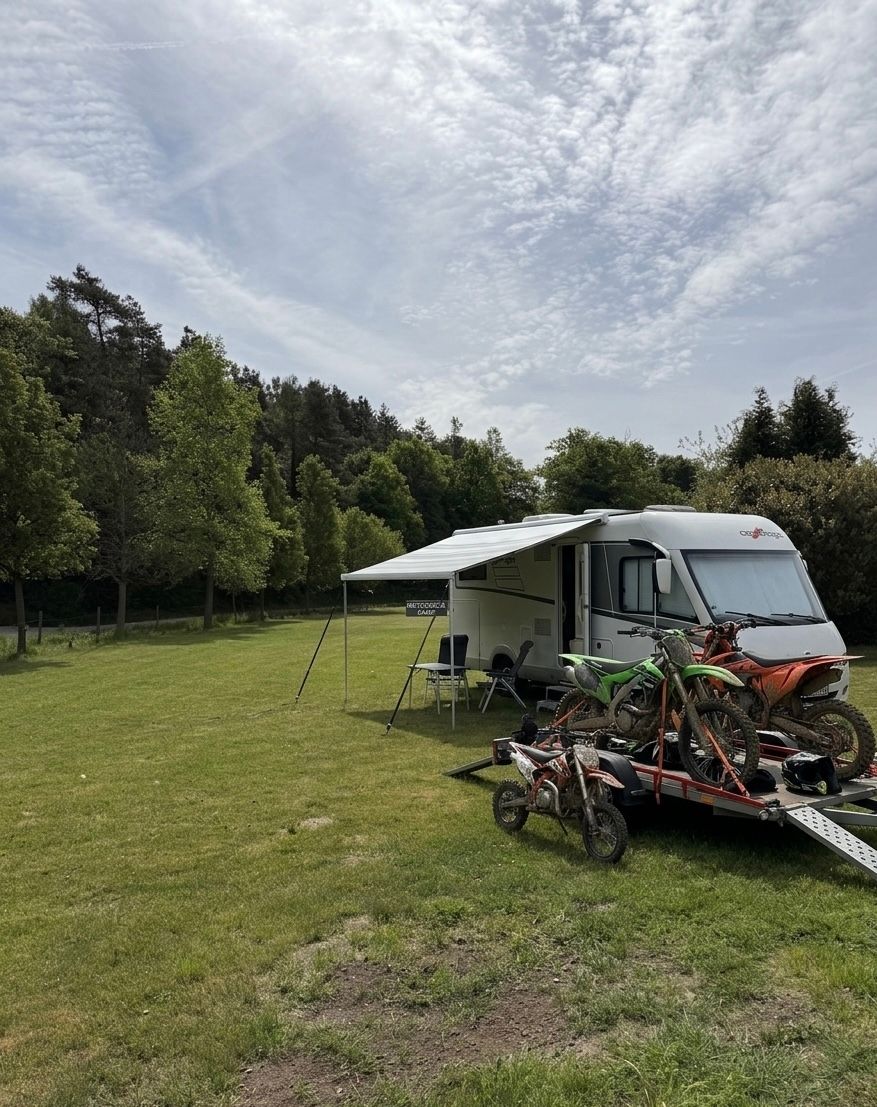 Caravan site at the edge of the forest