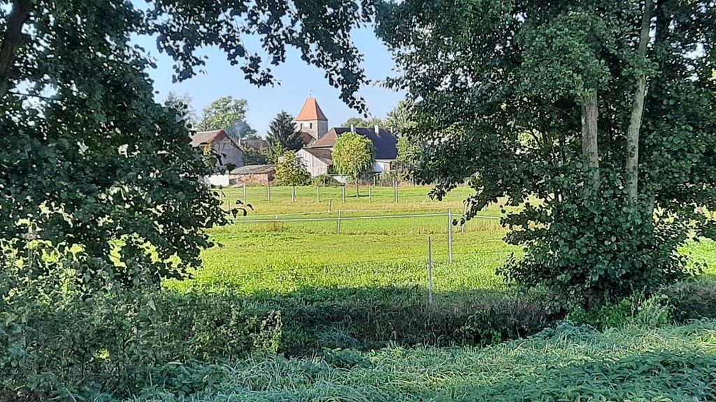 Camping in the pasture- view of a small village