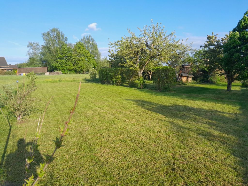 Camping in the orchard on the outskirts of the village