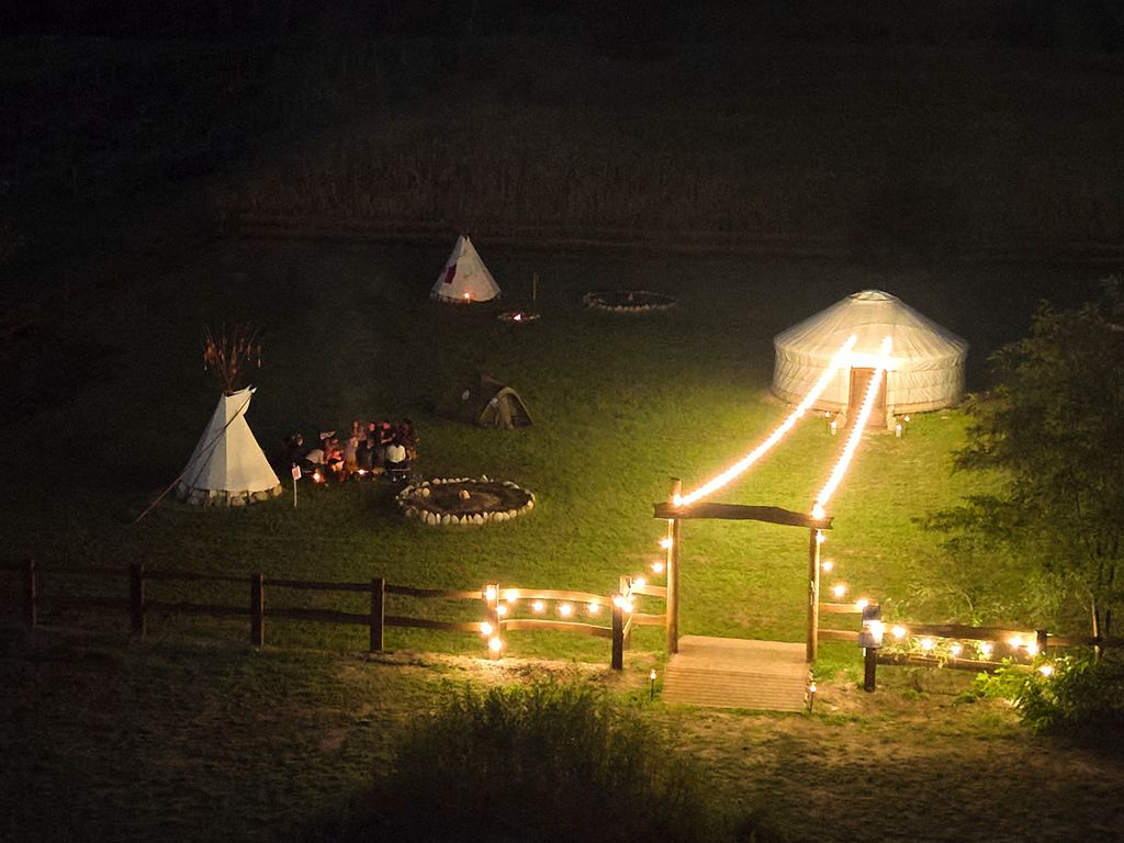 Village with 4 Tepees surrounded by nature