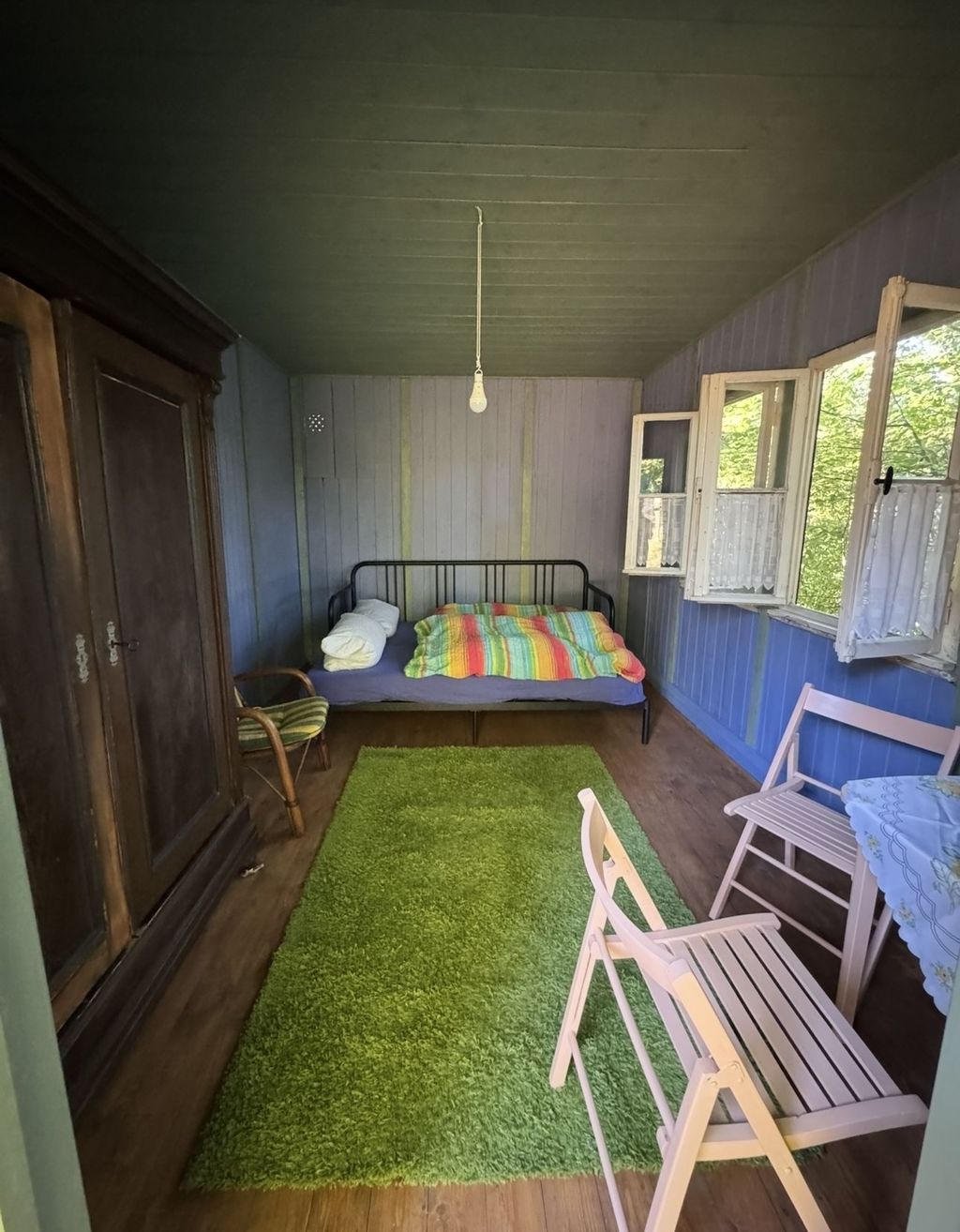 Minimalist comfort: Bed, table, and chairs provided. Please bring your own electricity, water, and toilet facilities.