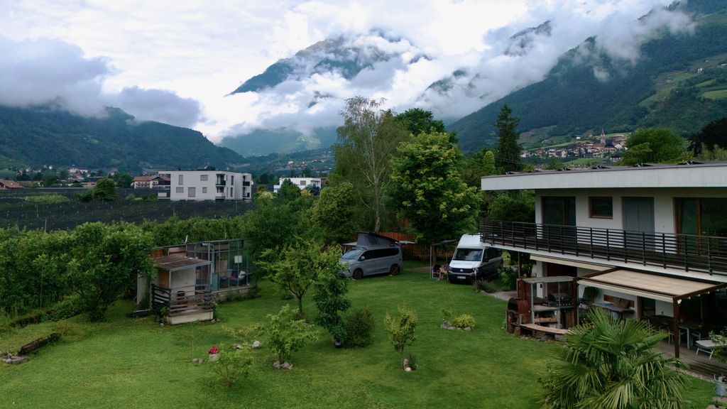 Camper pitch in Merano by the stream