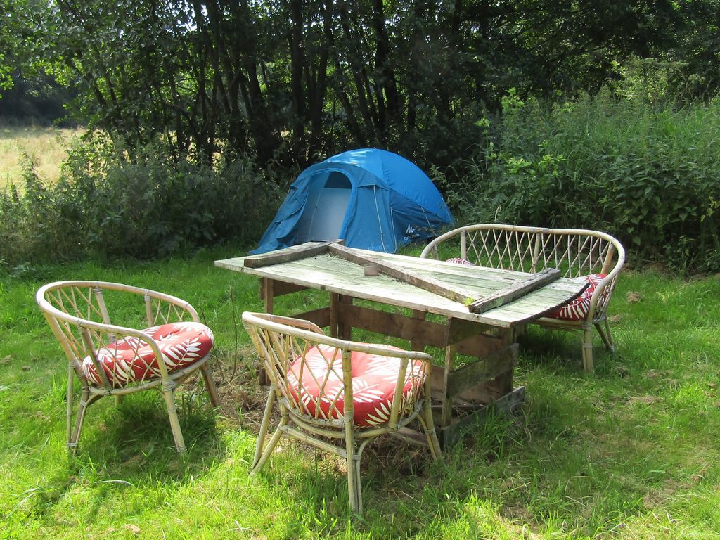 Secluded meadow by the grove in solitary location