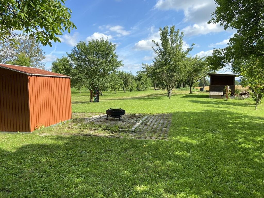 Single pitch between forest, meadows and fields