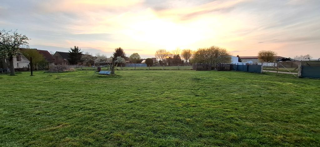 Spacious meadow on the edge of the village