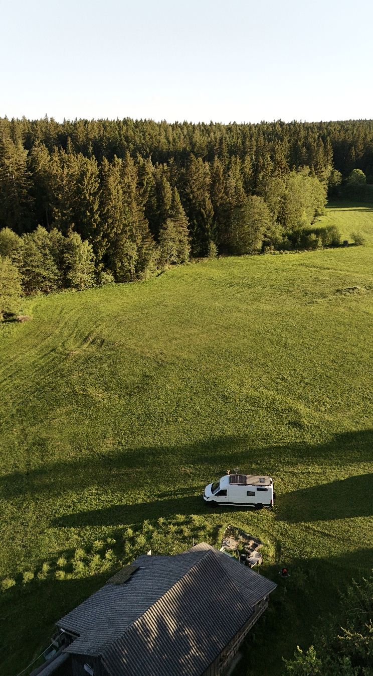 Camping on the alpine pasture and by the stream at 800 meters altitude