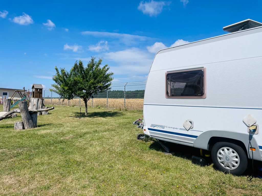 Camping at the edge of the field on the organic farm on the Müritz