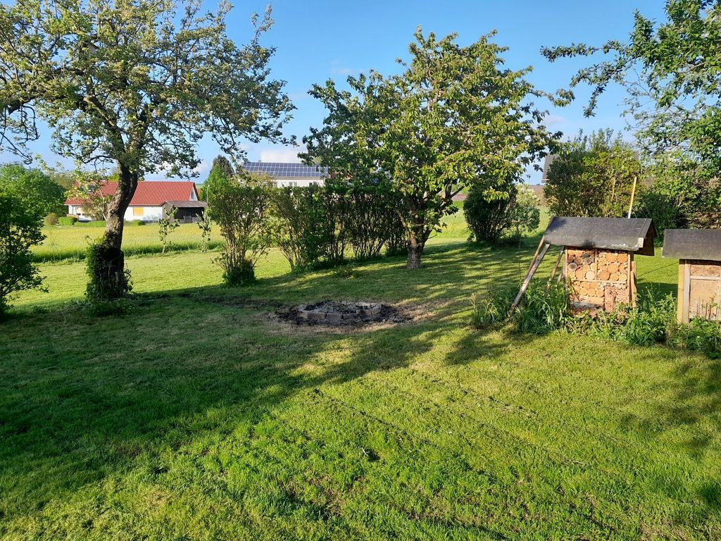 Camping in the orchard on the outskirts of the village