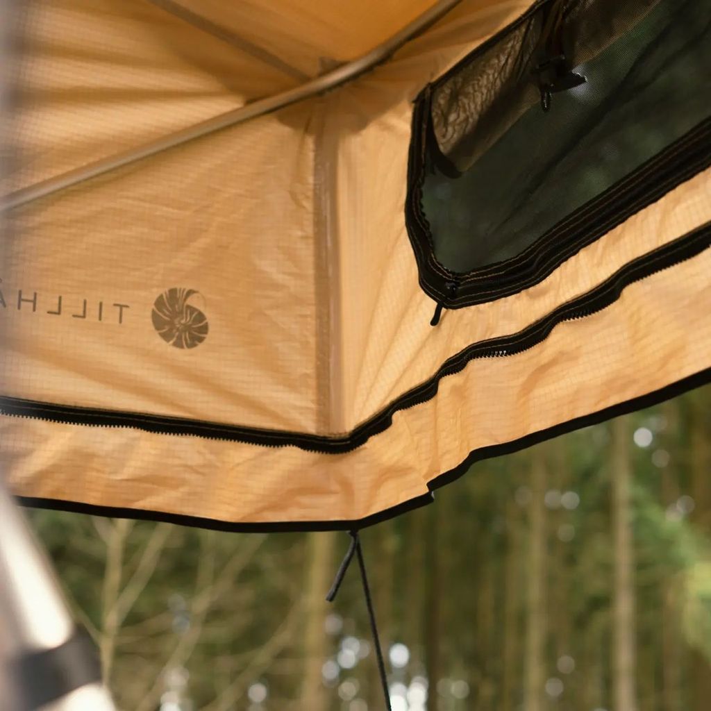 Lara - Rooftop tent adventure in the apple trees