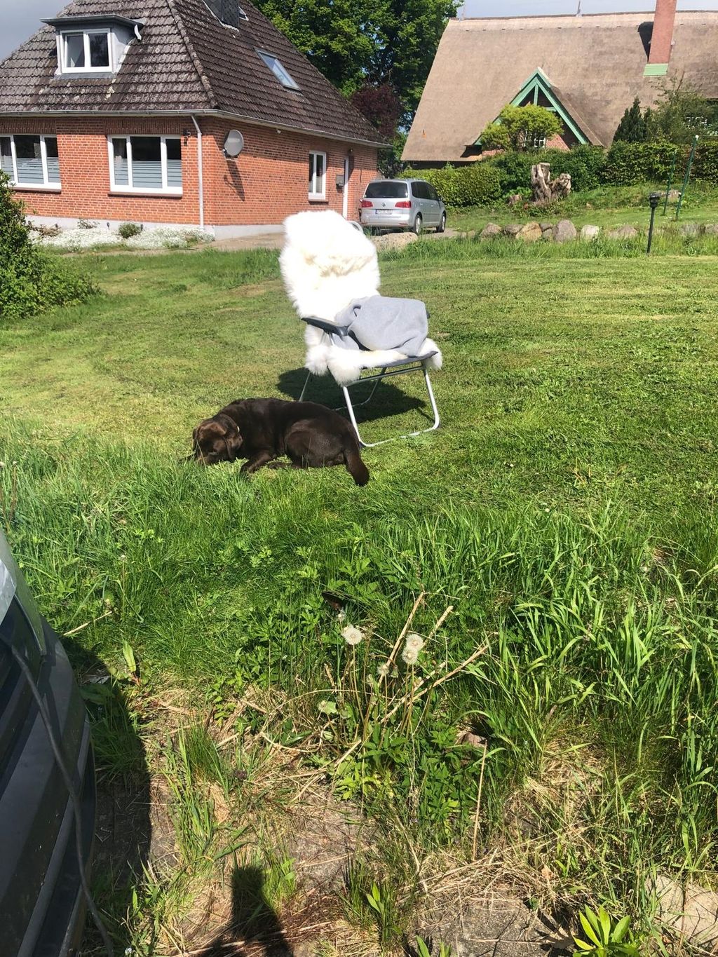 Time out in the cottage garden in front of the Bay of Lübeck