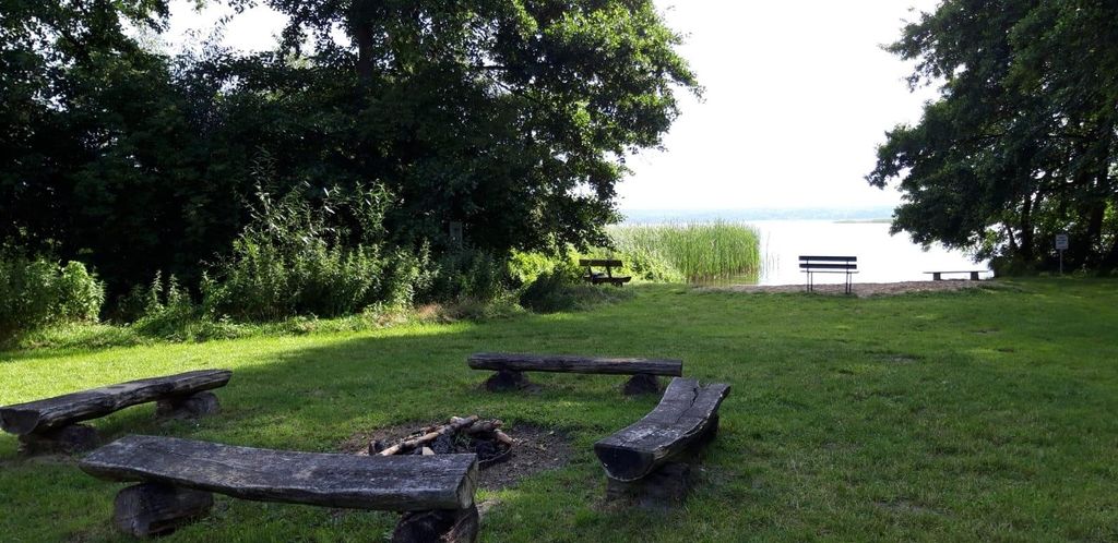 Shepherd's caravan on the lake with natural bathing place