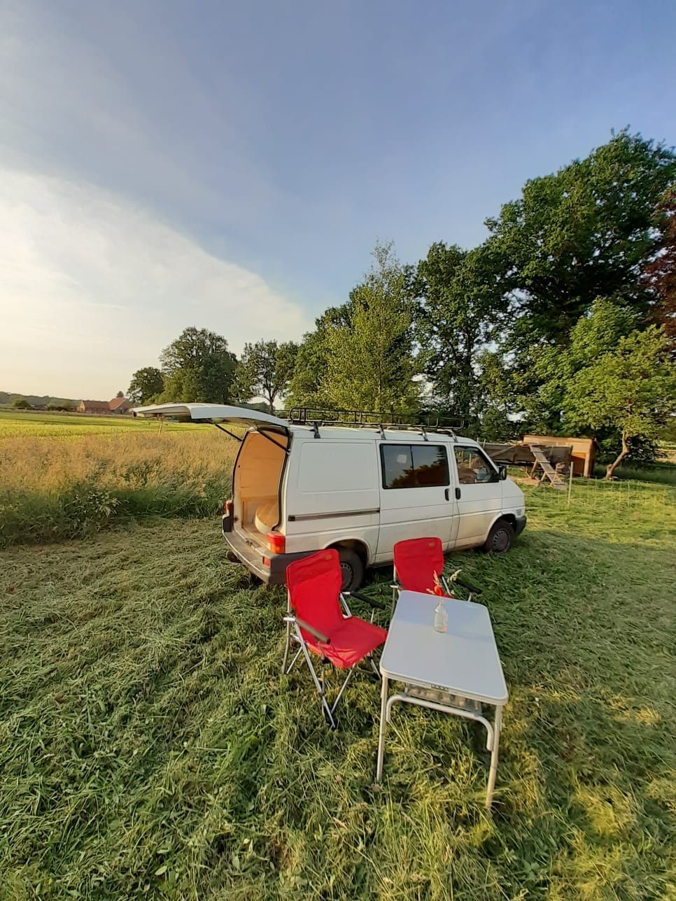 View of open field near old wheelwright's workshop