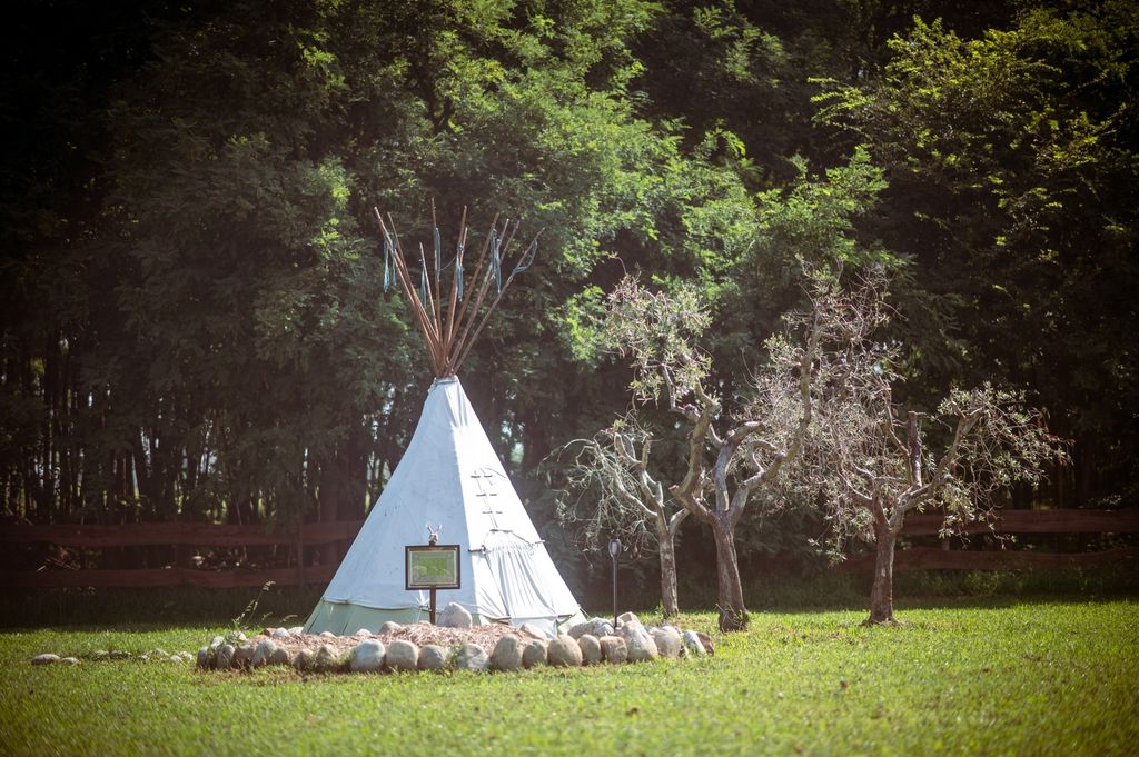Village with 4 Tepees surrounded by nature