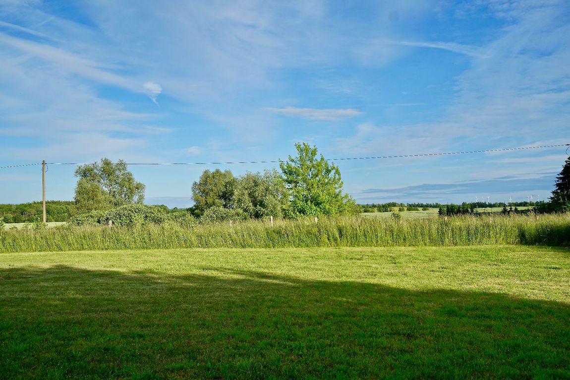 Pitch with view of forest, field and meadow